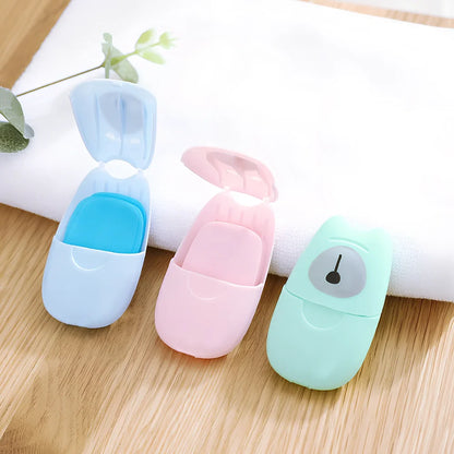 Pack of 50 pink biodegradable soap paper sheets, each 8x4.5cm, for portable hand cleaning on travels