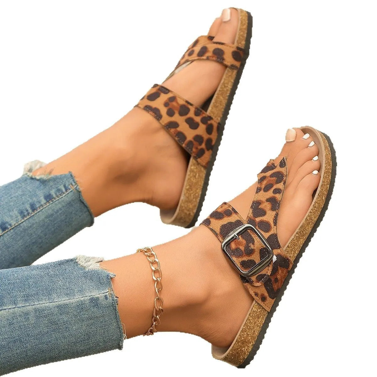 Leopard print Roman style slippers with a round toe and wooden sole.