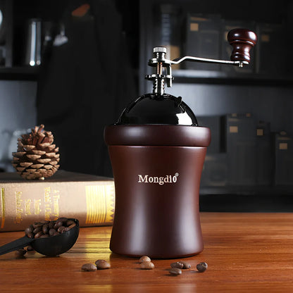 Manual coffee grinder with solid wood barrel and ceramic burrs for precise grinding control