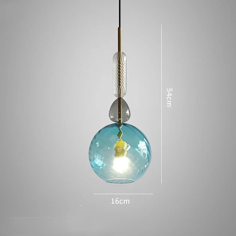 Glass chandelier with adjustable height above bar counter showing macaron-inspired candy glass design