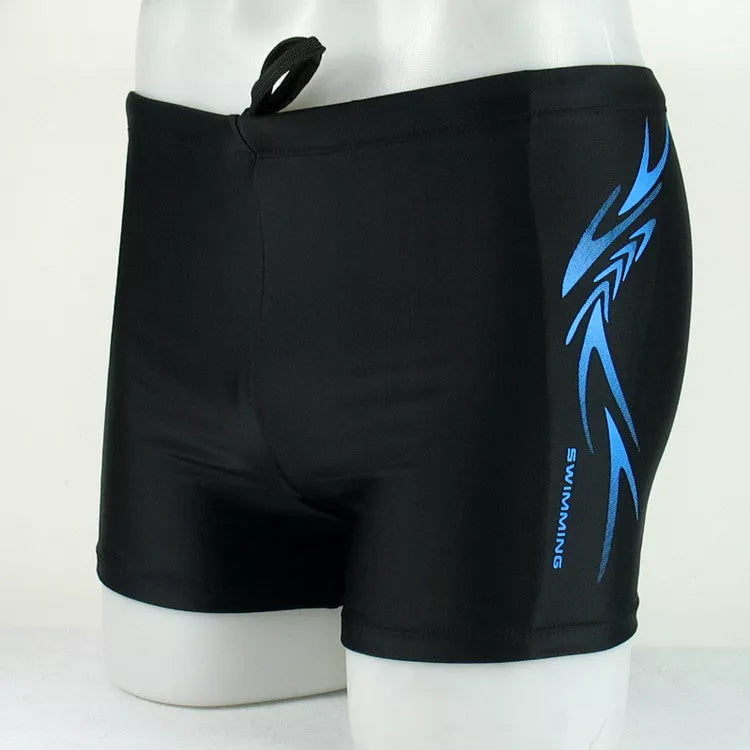 Men's boxer swimming trunks in dark blue and black, featuring quick-dry lining and stretch fabric