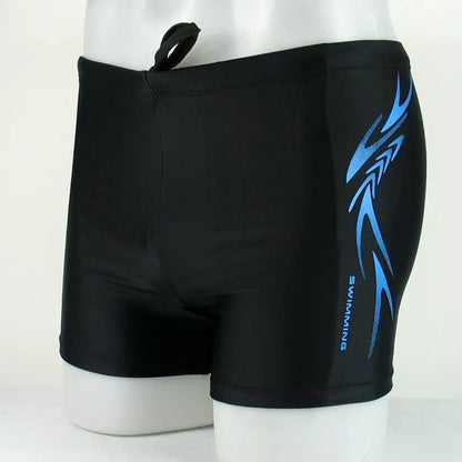 Men's boxer swimming trunks in dark blue and black, featuring quick-dry lining and stretch fabric