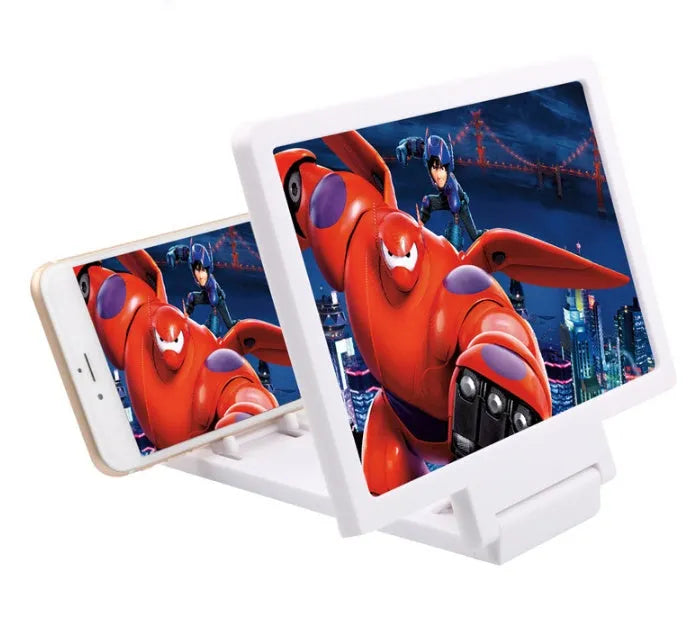 Black 3D phone screen amplifier stand holding a mobile phone, showing enlarged display on a desk.