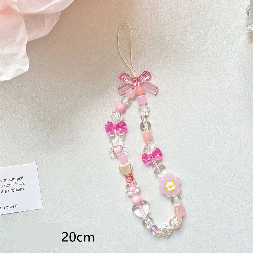 Beaded flower mobile phone lanyard with blue resin flowers on adjustable 120cm cord and secure clasp