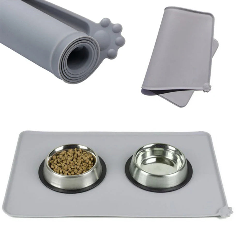 Silicone pet food mat with raised edges and non-slip base to contain messes and protect floors during pet mealtimes