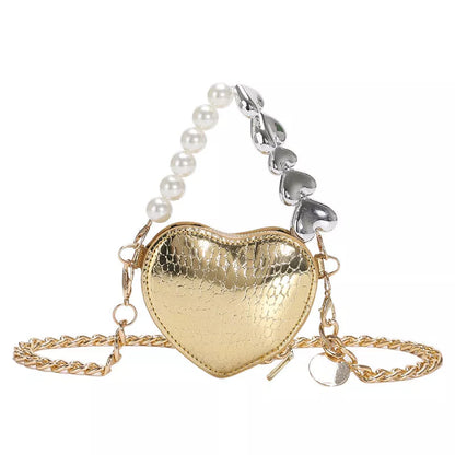 Mini heart-shaped pearls handbag in silver with adjustable chain strap