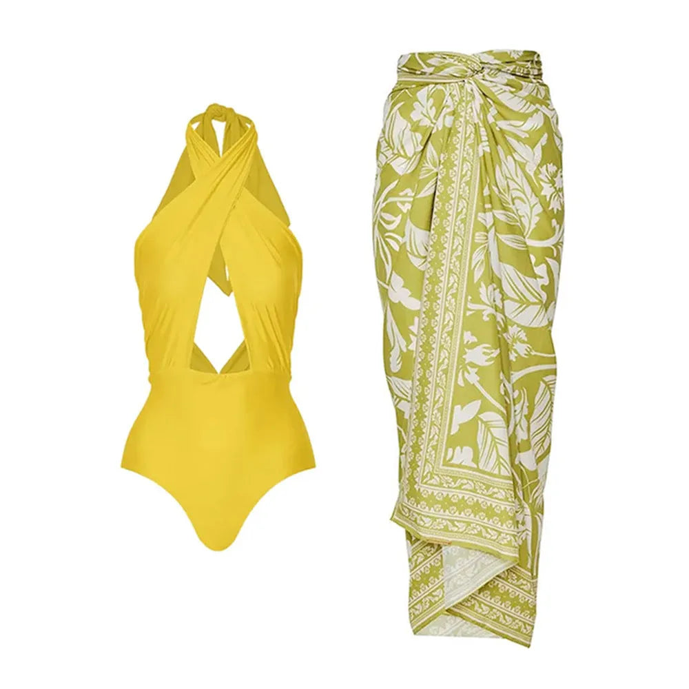 Women's solid colour halter neck swimsuit with matching wrap skirt set