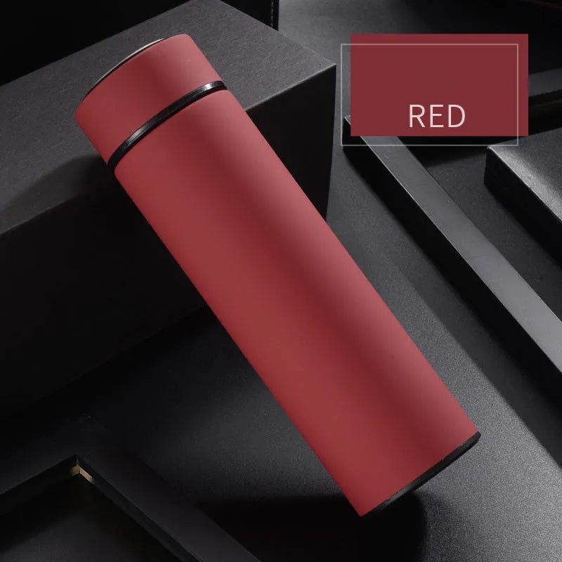 Stainless steel water bottle with double-wall vacuum insulation, shown in black, red, gold, and blue colour options.