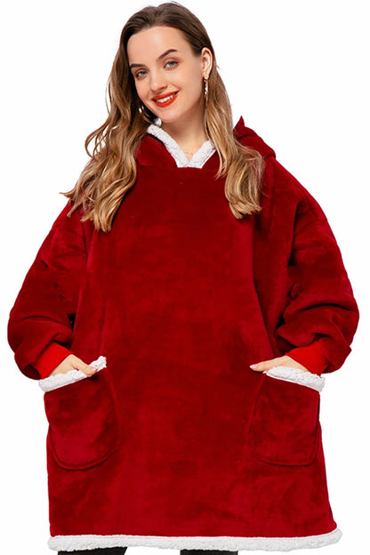 Cozy TV Blanket Hoodie in a variety of colors, featuring a plush polyester design with a front pocket and adjustable drawstring hood
