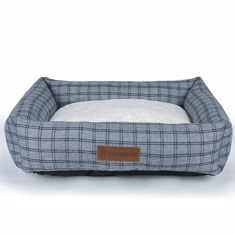 Grey linen fabric square dog bed measuring 60x50cm on a wooden floor