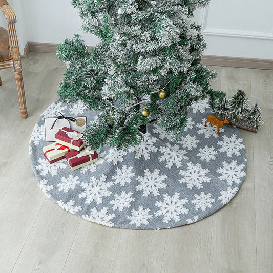 Elegant Christmas tree skirt with plush snowflake design, creating a cozy and festive holiday atmosphere.