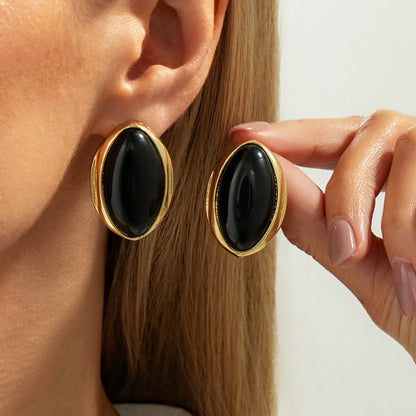 Gold-tone oval drop earrings with resin centre in French retro court style for women