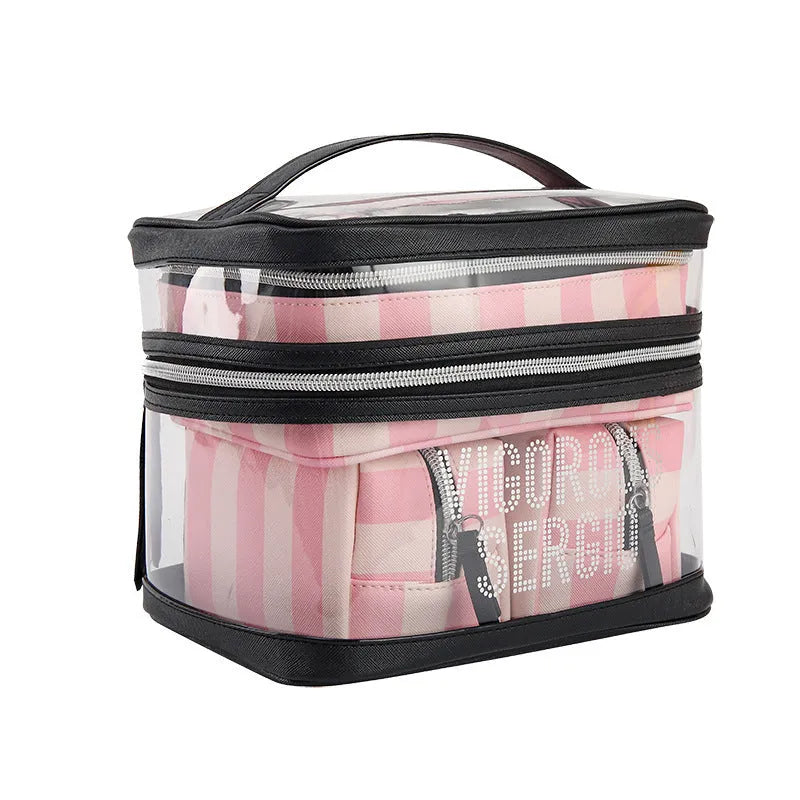 Pink and white floral pattern makeup bag with bold stripes, made from synthetic leather.