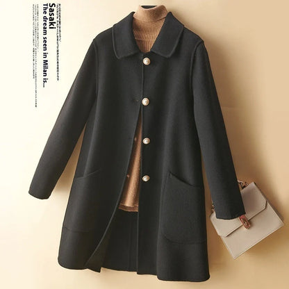 Women's black wool mid-length coat with doll collar and pearl buckle, showing double-faced fabric and 65cm length.