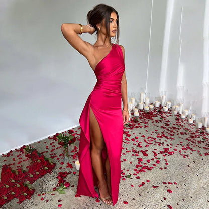 One-shoulder backless slit dress made of luxurious satin, available in a variety of vibrant colors