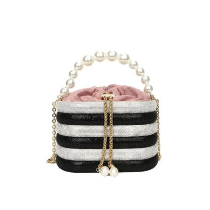 Women's soft PU crossbody bag with beaded accents, round shape, and single shoulder strap in black colour.