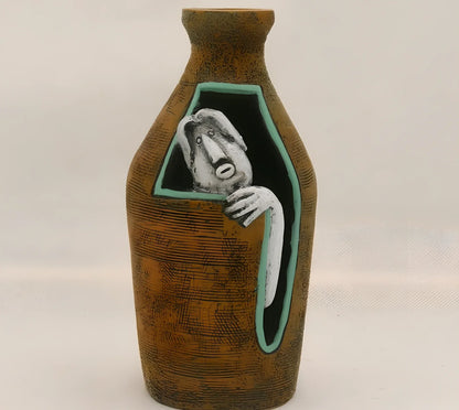 Blue hand-painted abstract resin wall vase measuring 18cm tall with pendant hanging form