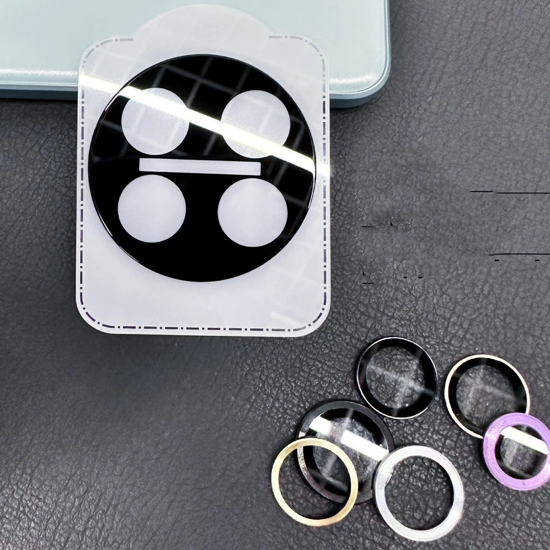 Tempered glass camera lens protector with black ring for OnePlus 12, Find N3, and OnePlus 11 phones.