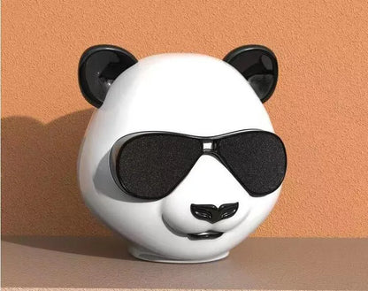Portable mini Bluetooth speaker with classic style design, showing USB port and approximate 8cm diameter size