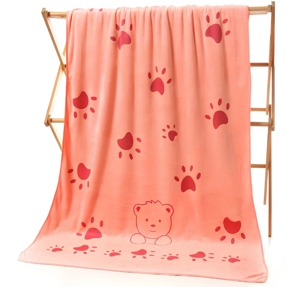 Microfiber bath towel with cartoon character print measuring 70cm wide by 140cm long