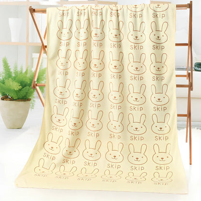 Microfiber bath towel with cartoon character print measuring 70cm wide by 140cm long