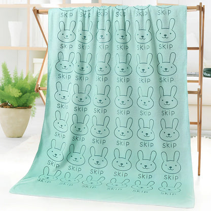 Microfiber bath towel with cartoon character print measuring 70cm wide by 140cm long