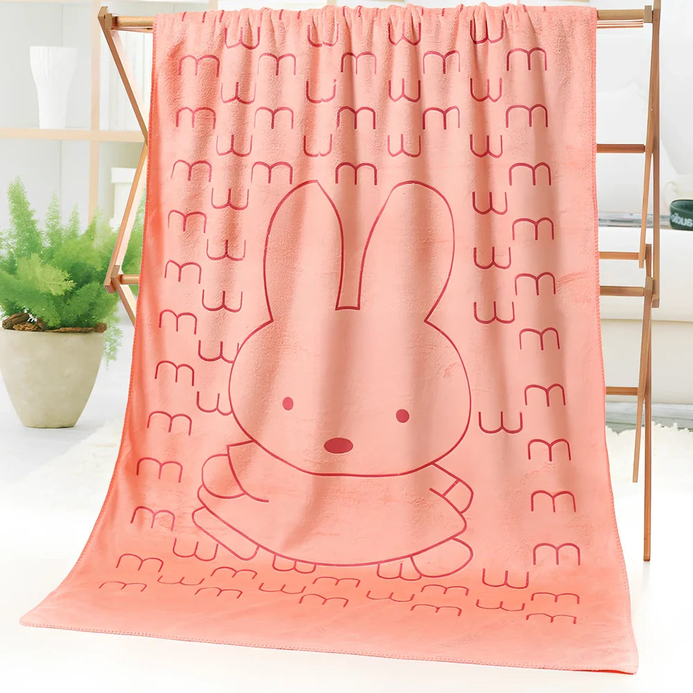 Microfiber bath towel with cartoon character print measuring 70cm wide by 140cm long