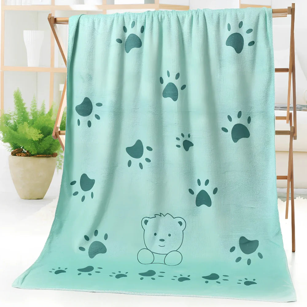 Microfiber bath towel with cartoon character print measuring 70cm wide by 140cm long