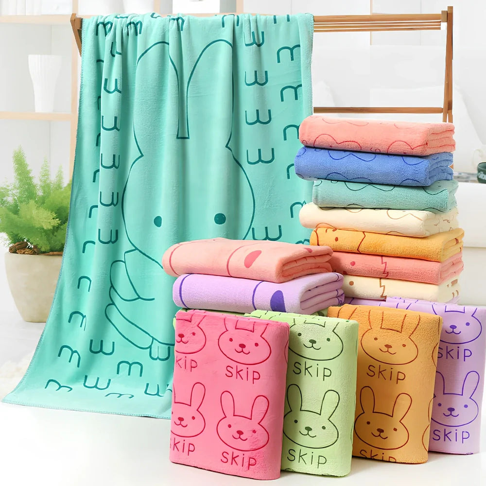 Microfiber bath towel with cartoon character print measuring 70cm wide by 140cm long