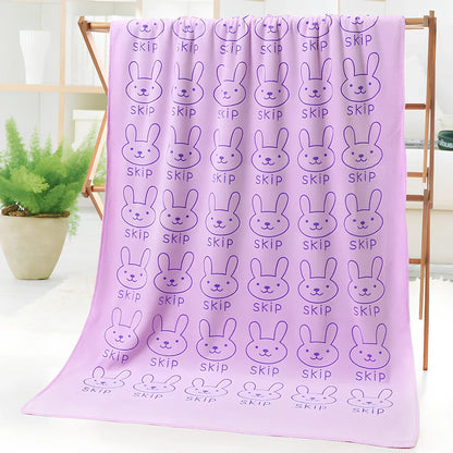 Microfiber bath towel with cartoon character print measuring 70cm wide by 140cm long