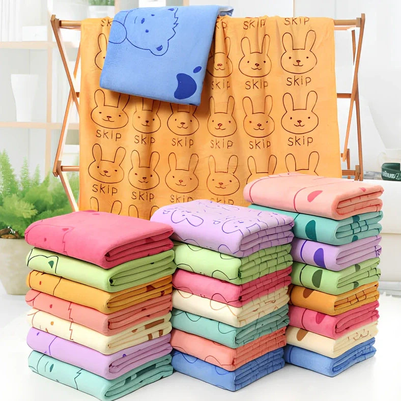 Microfiber bath towel with cartoon character print measuring 70cm wide by 140cm long