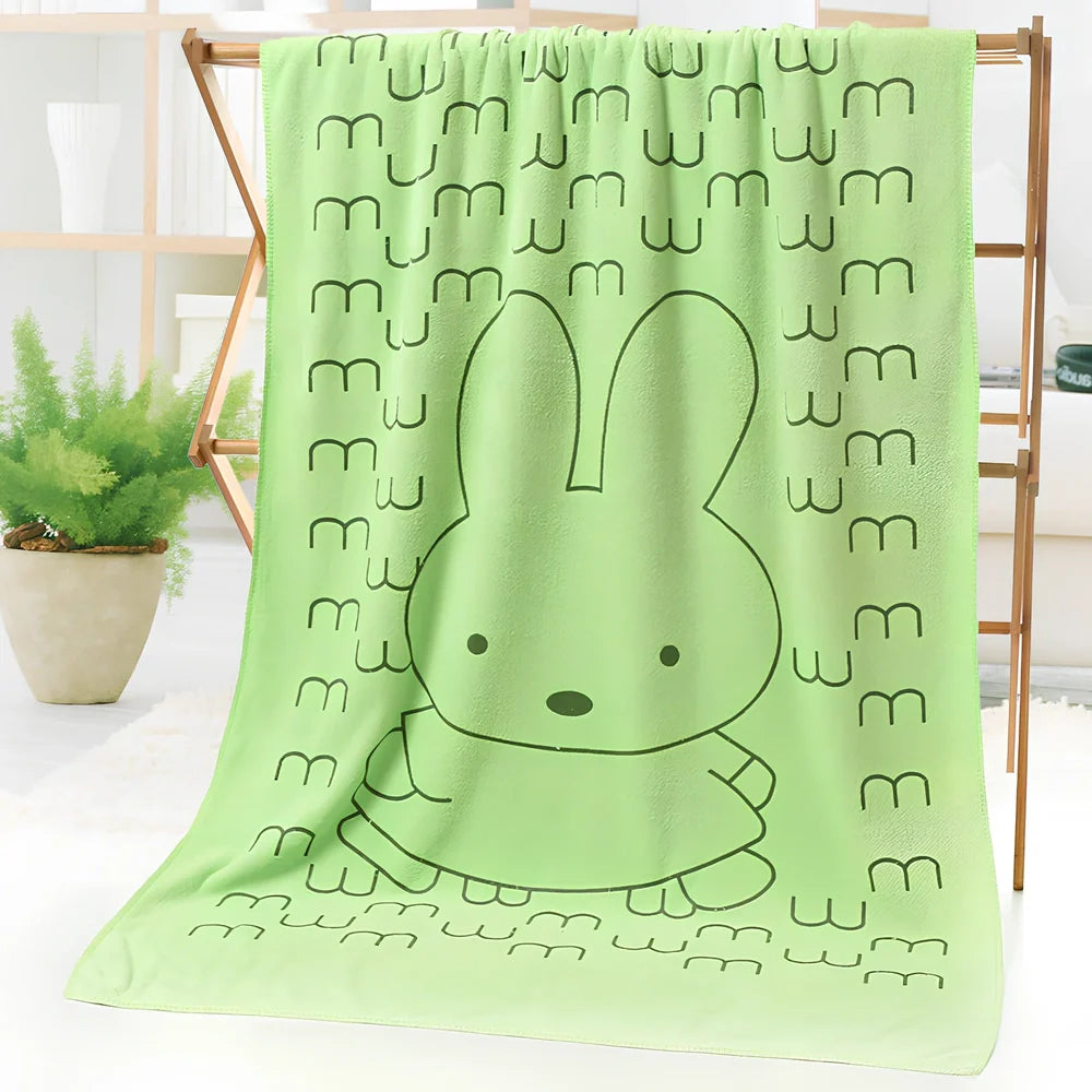 Microfiber bath towel with cartoon character print measuring 70cm wide by 140cm long