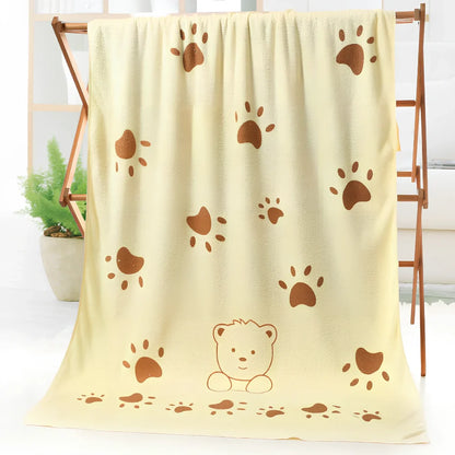 Microfiber bath towel with cartoon character print measuring 70cm wide by 140cm long