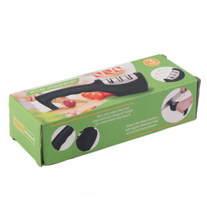 Black manual knife sharpener with three tungsten wire slots and rubber feet on base