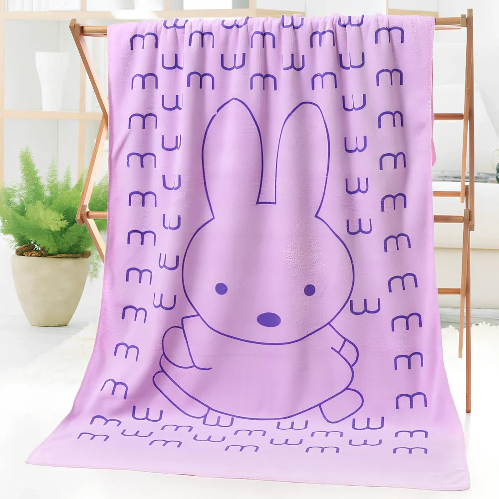 Microfiber bath towel with cartoon character print measuring 70cm wide by 140cm long