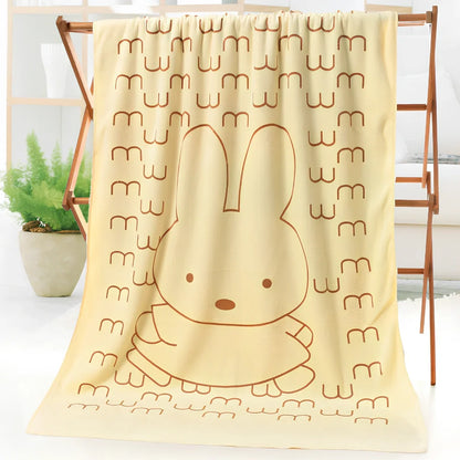 Microfiber bath towel with cartoon character print measuring 70cm wide by 140cm long