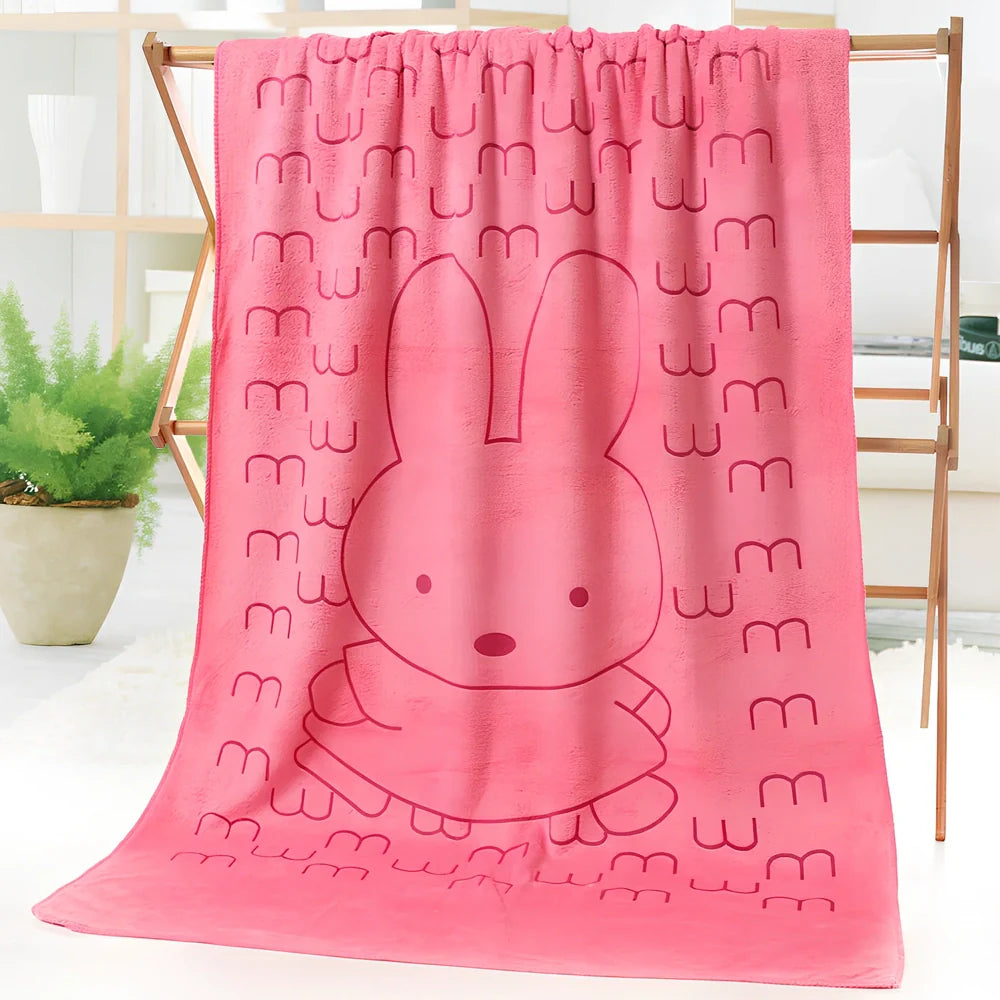 Microfiber bath towel with cartoon character print measuring 70cm wide by 140cm long