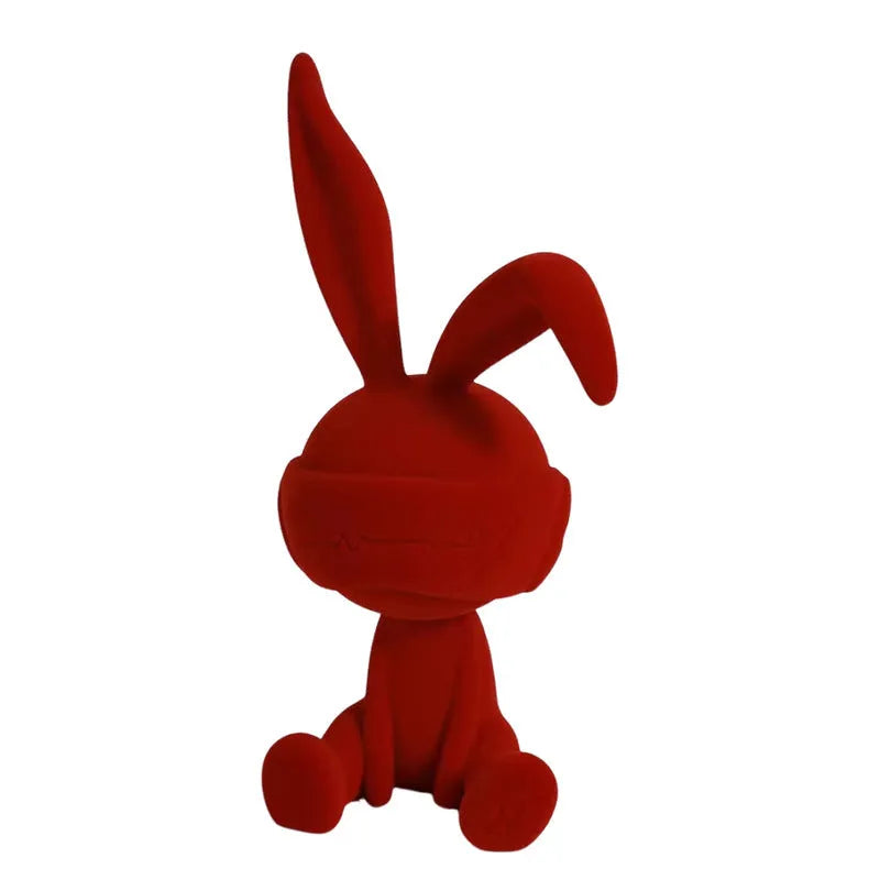 Green suede blindfold rabbit resin table ornament on a wooden shelf, showing detailed texture and 12cm height