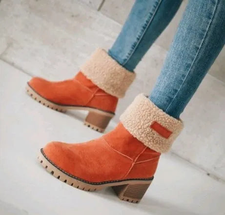 Mid-tube thick heel suede snow boots in black with beef tendon sole and waterproof platform.