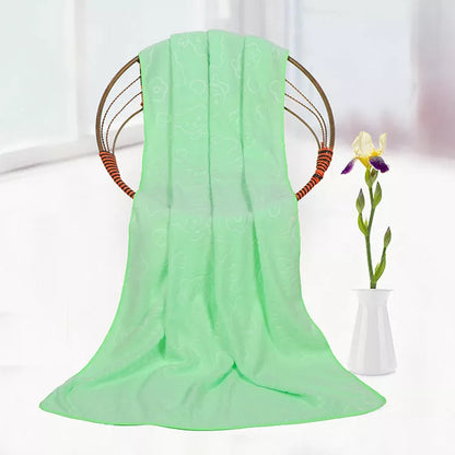 Bear embossed microfiber bath towel in vibrant colors, quick-drying and soft