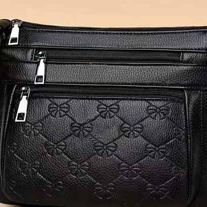 Butterfly black women's crossbody bag with horizontal square shape and embossed pattern