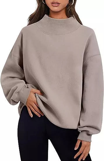 Women's solid color pullover sweatshirt with round neck and loose fit