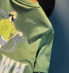 Green men's loose fit t-shirt with 'Literary Youth' text print on the front.