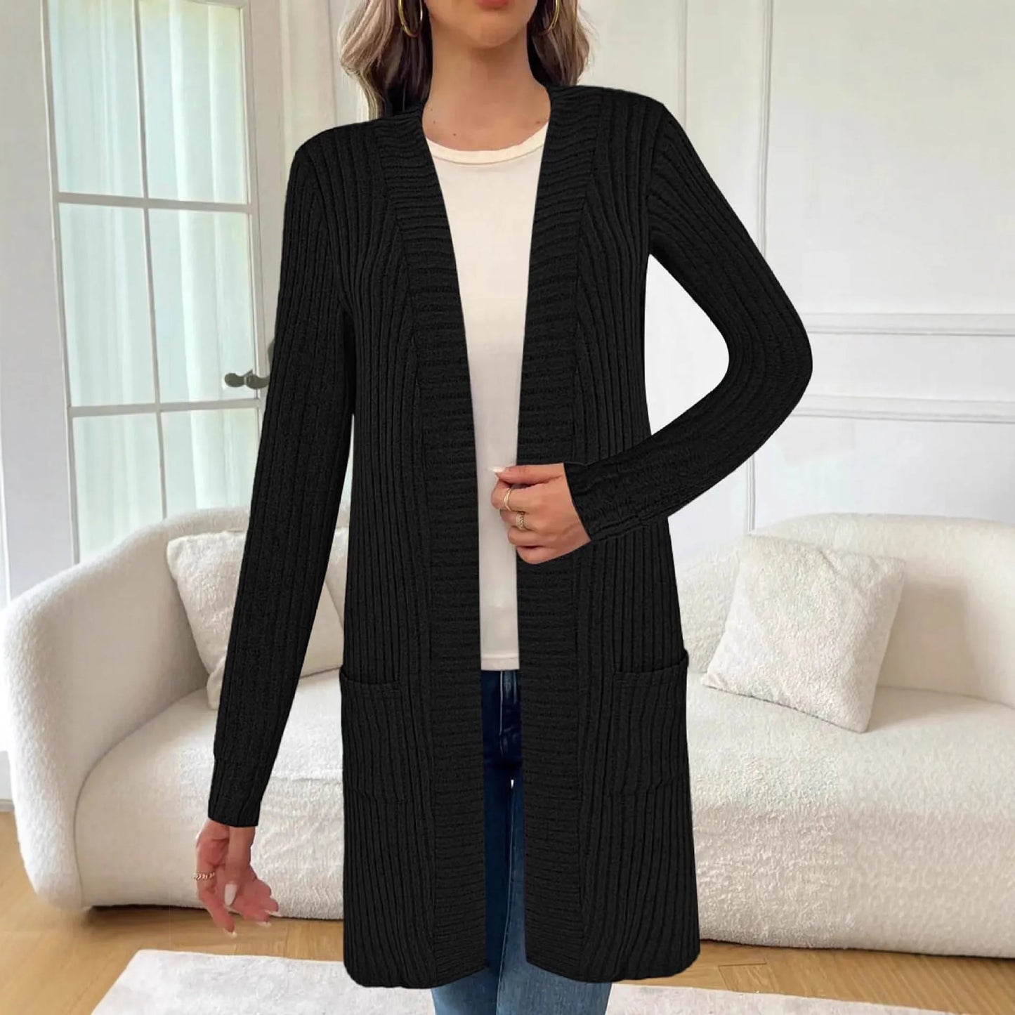 A loose-fit long sleeve knitted cardigan jacket with pockets, shown in black, grey, or wine red.