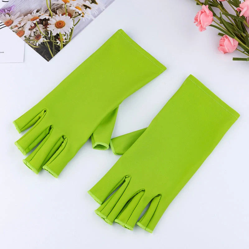 Manicure gloves with UV protection, featuring a stylish half-finger design and hand-painted finish for a comfortable and functional at-home nail care experience.
