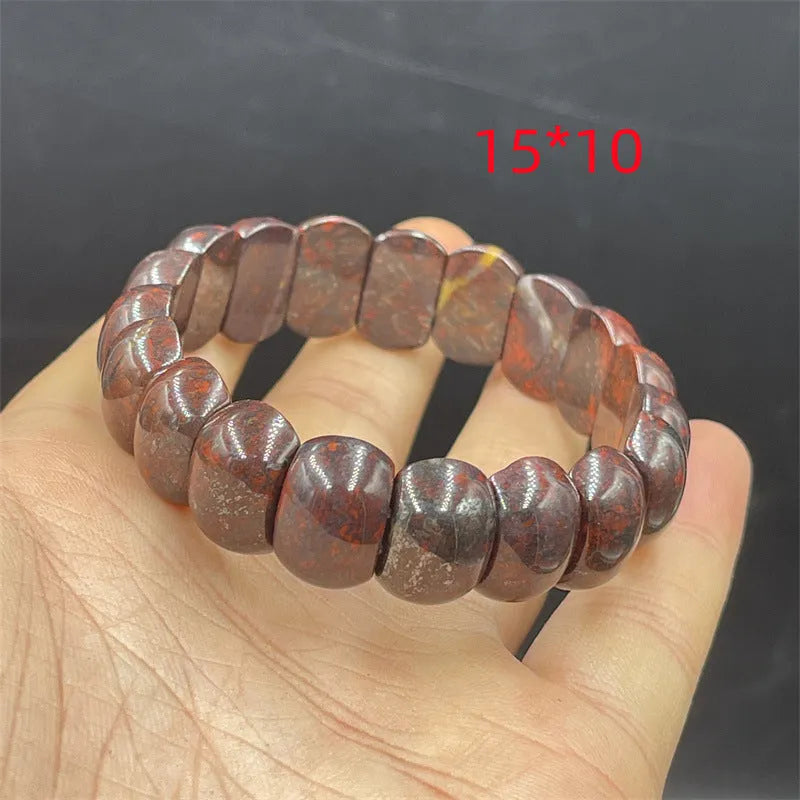 Bloodstone meteorite bracelet in quartz rock jade with traditional pendant options on wrist