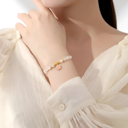 Pink silver bracelet with cherry blossom pendant and Hetian jade beads