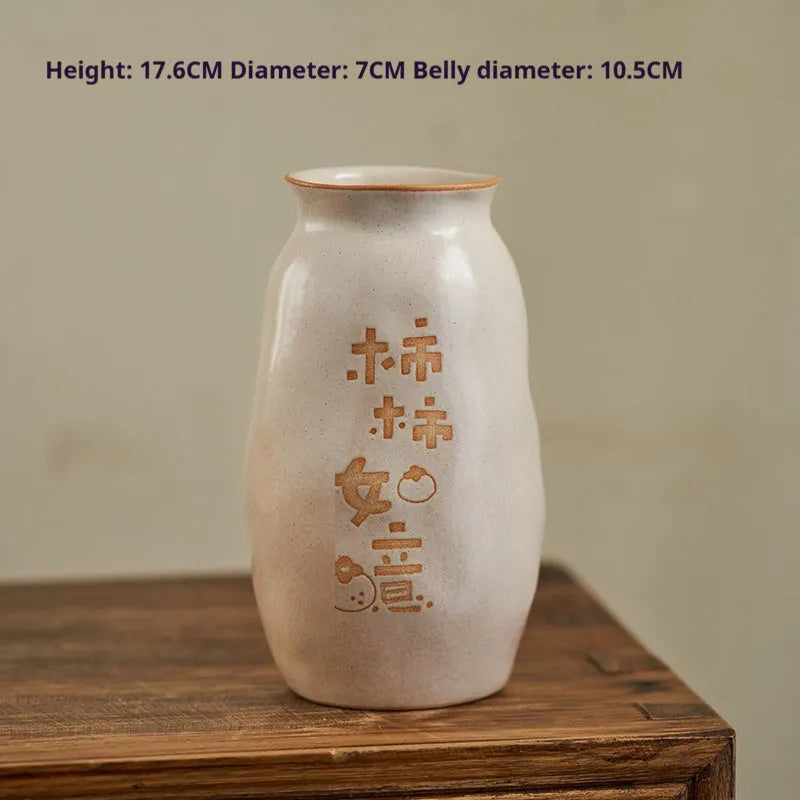 Hand-painted Chinese ceramic vase with carved detail on a desk, shown in Double Happiness colour design.