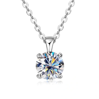 Elegant four-claw diamond necklace in silver and gold, perfect for any occasion.