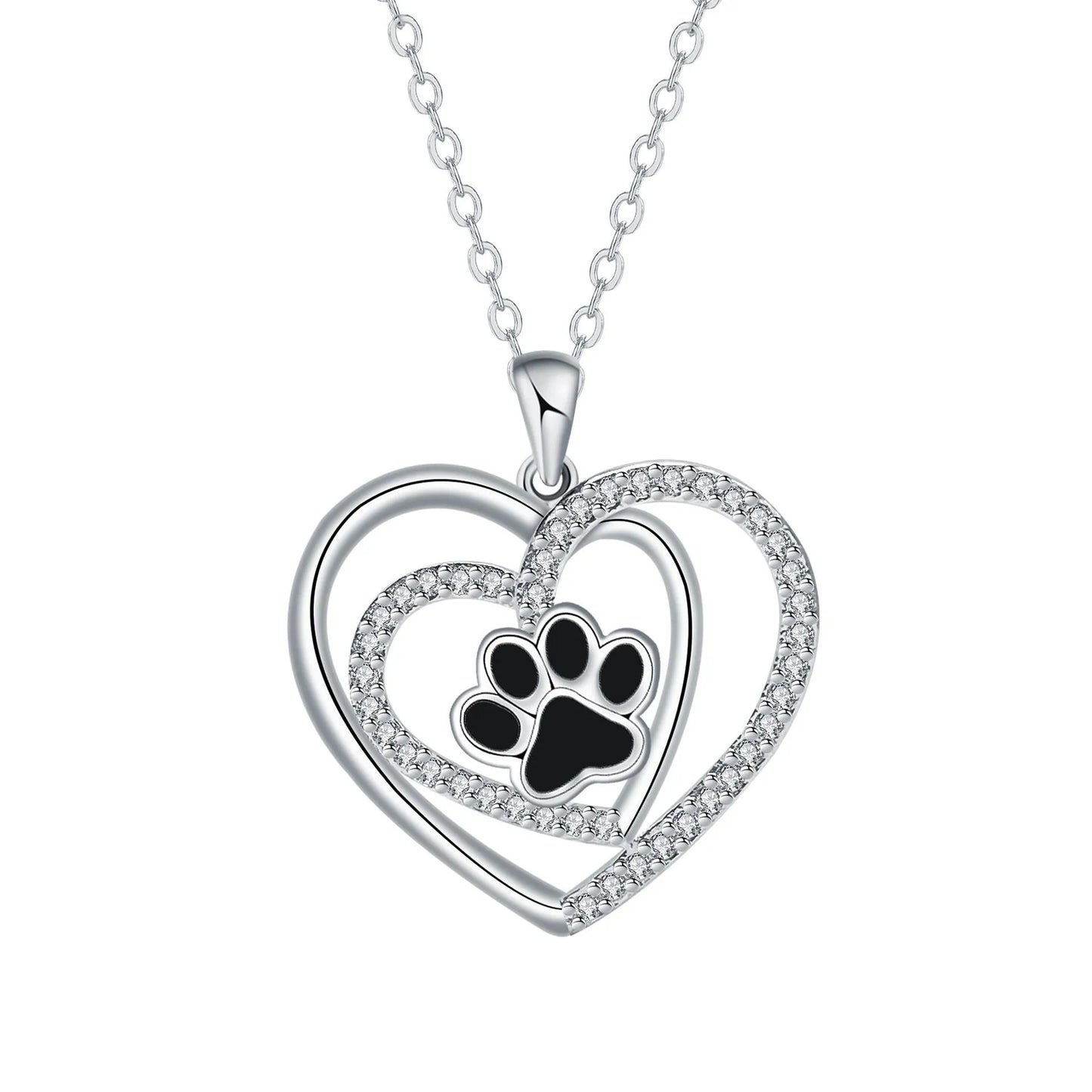 Copper heart pendant necklace with engraved dog paw print on a cross chain.